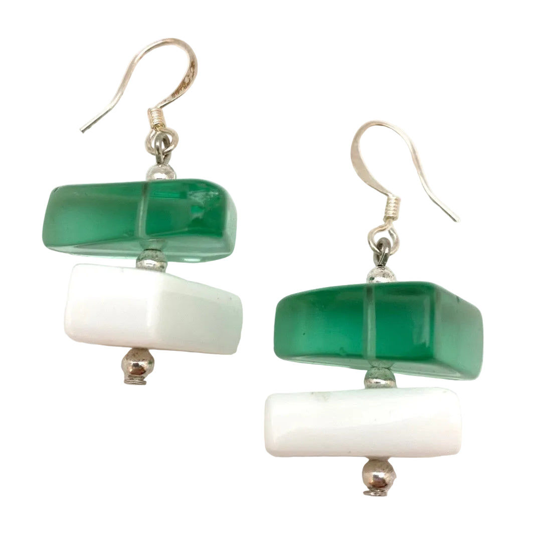Pair of earrings with green and white rectangular beads on a light background