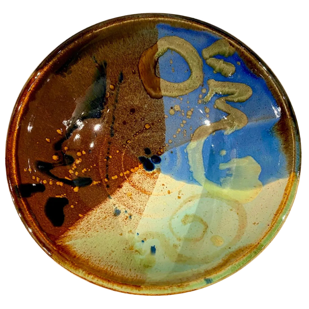 Ceramic plate with abstract design on a white background