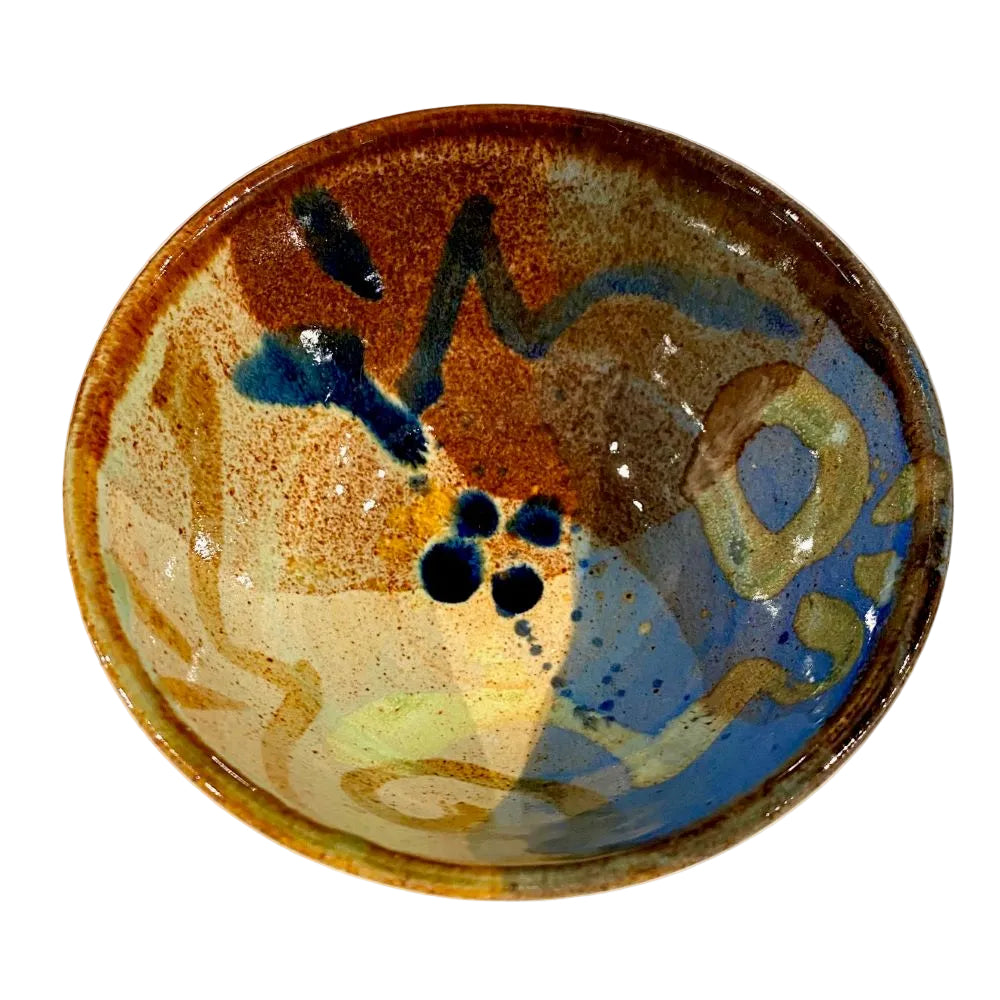 Ceramic bowl with abstract design on a white background