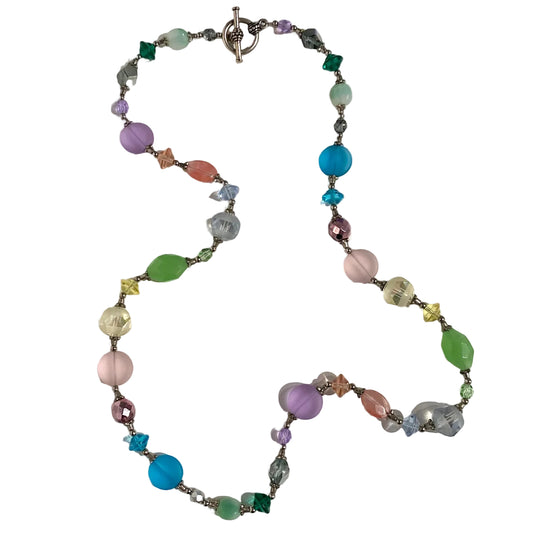 Colorful beaded necklace on a light background