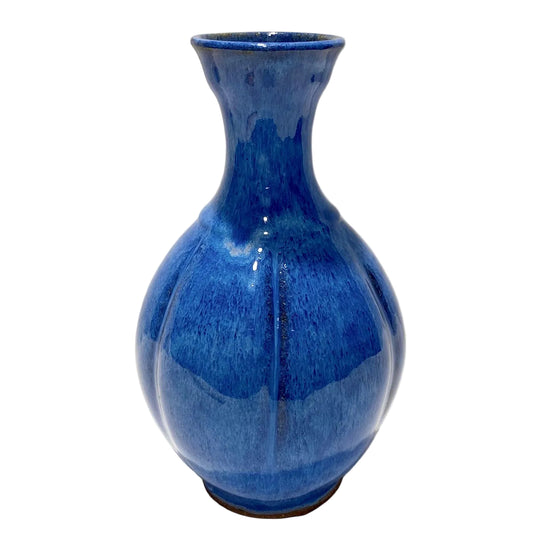 Blue ceramic vase on a white background