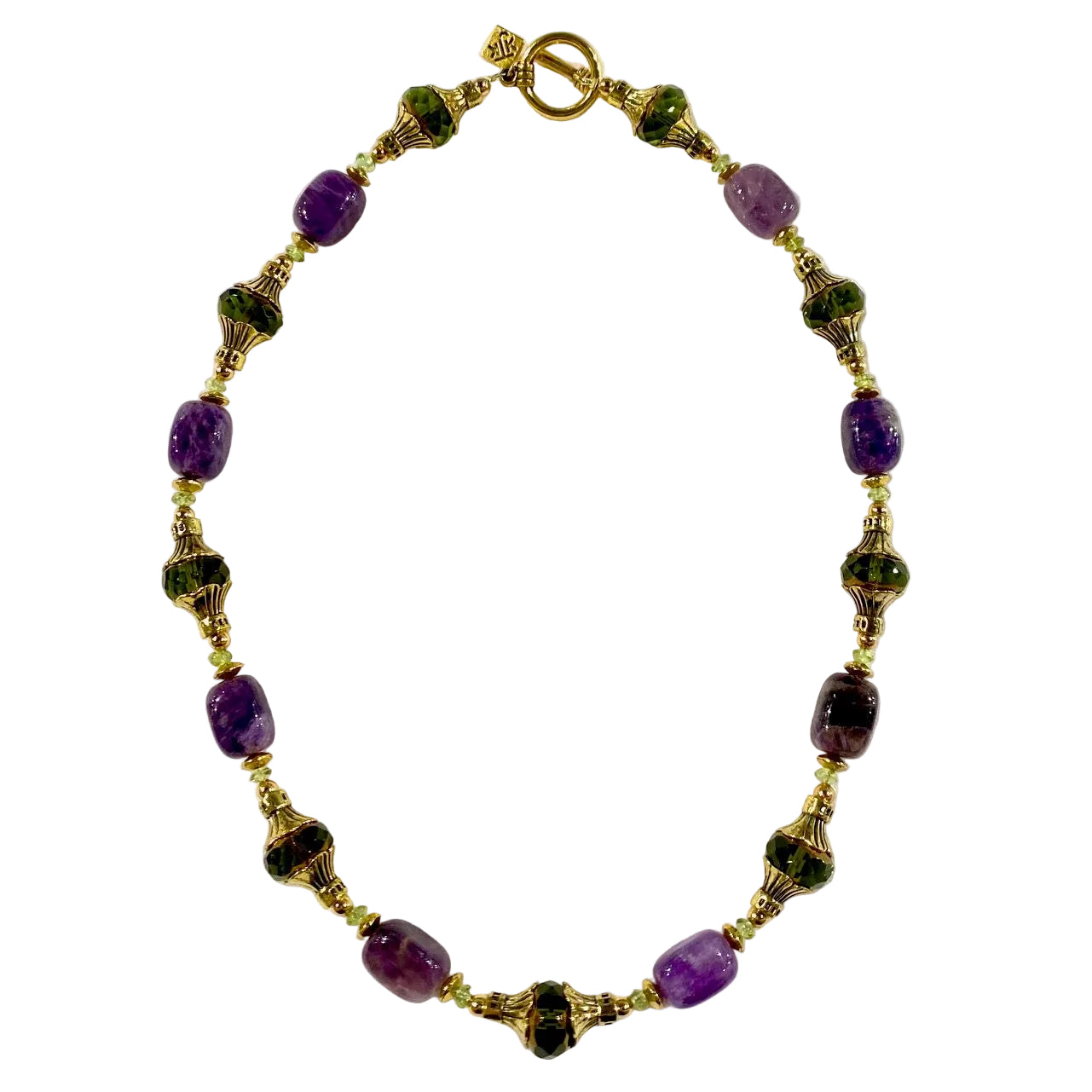 Necklace with purple and green beads on a white background