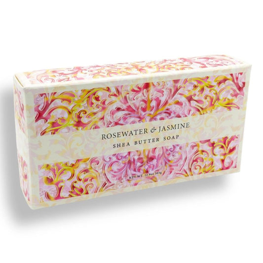 Shea butter soap bar with floral packaging on a white background