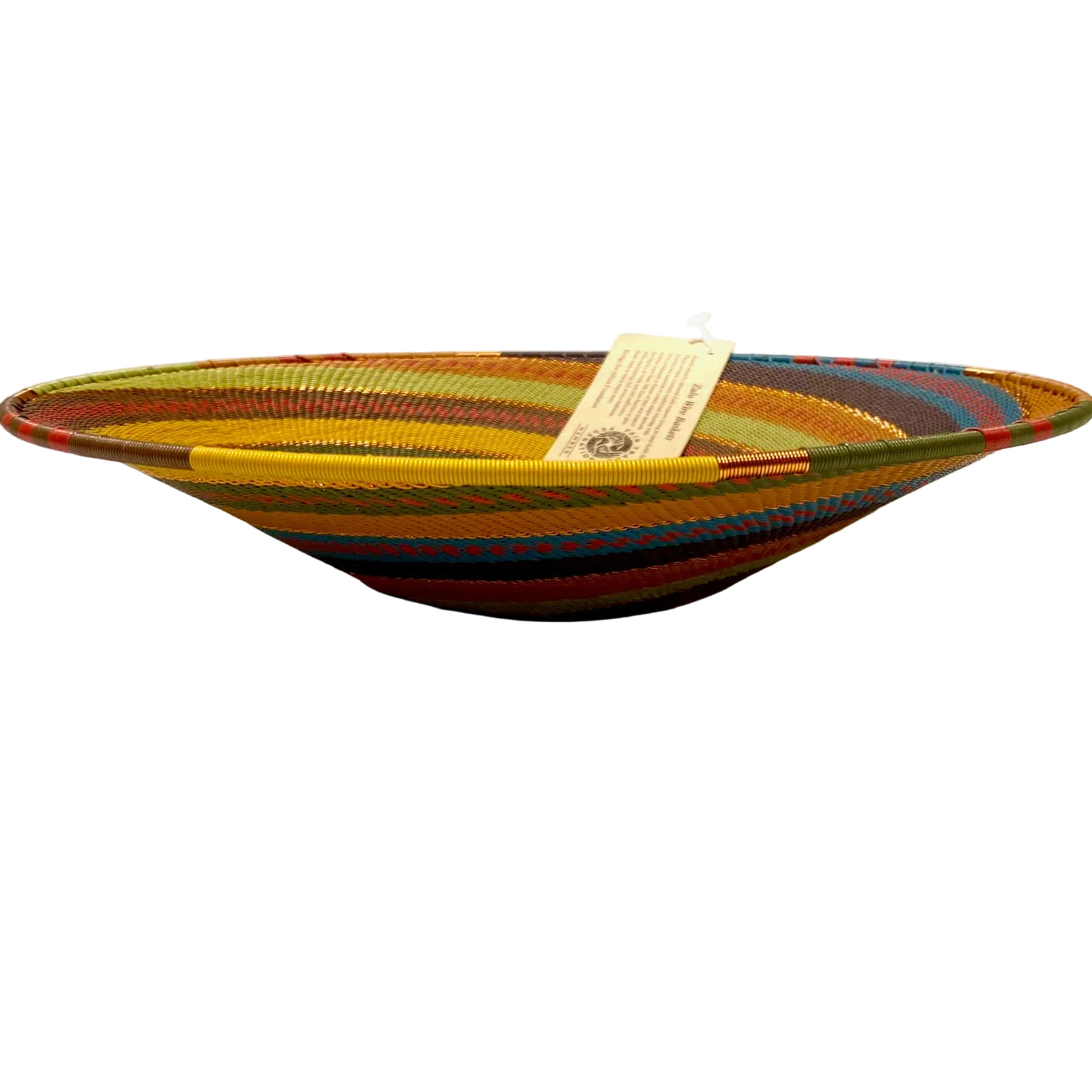Colorful woven bowl with a tag on a white background