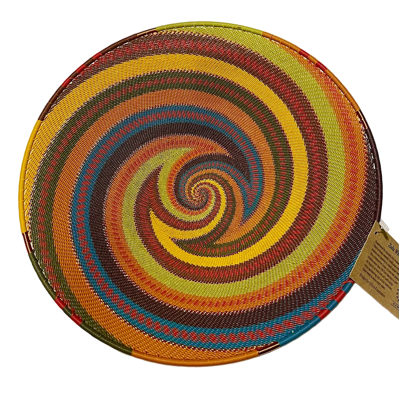 Colorful woven basket with a spiral pattern on a white background