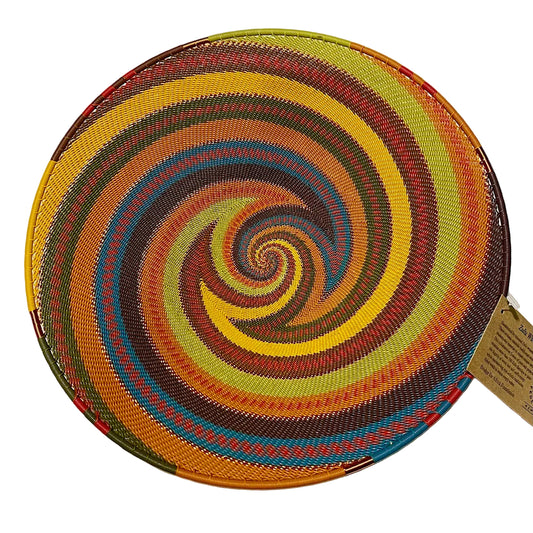 Colorful woven basket with a spiral pattern on a white background