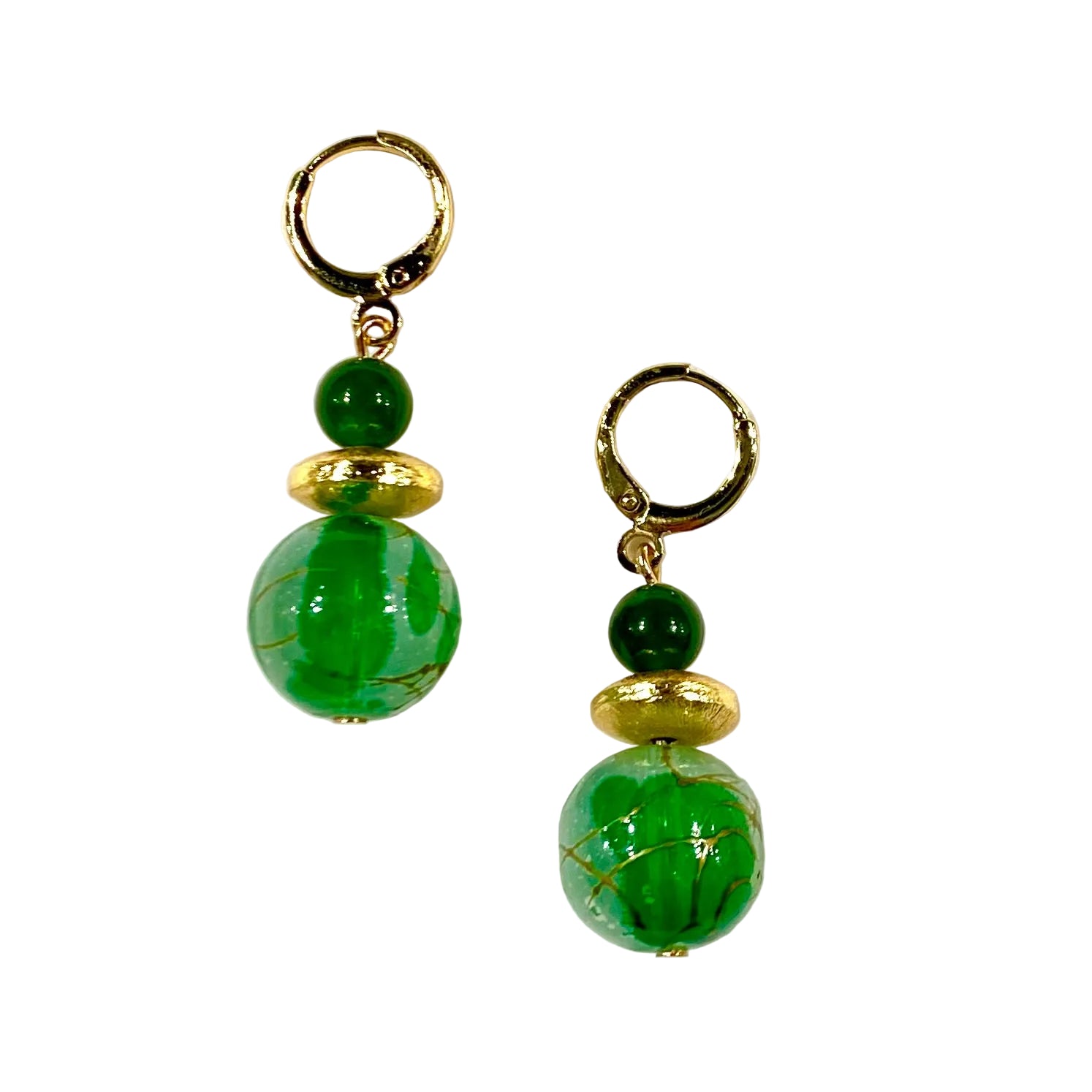 Pair of green beaded earrings with gold accents on a white background