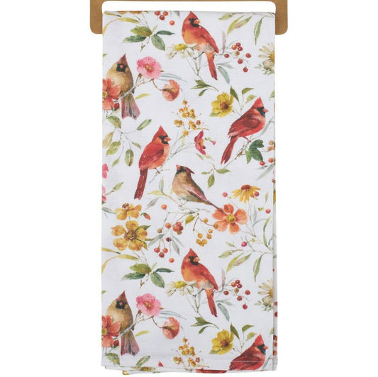Floral towel with red cardinals on a white background
