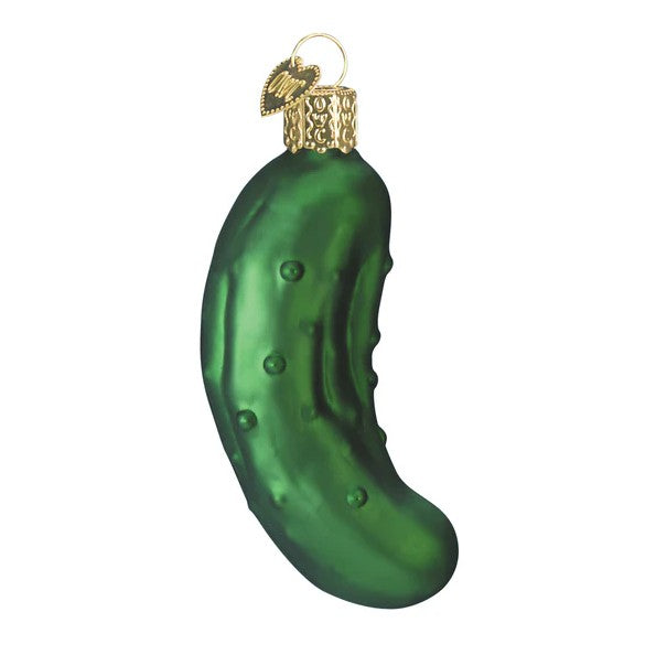 Green pickle-shaped ornament with a gold top on a white background
