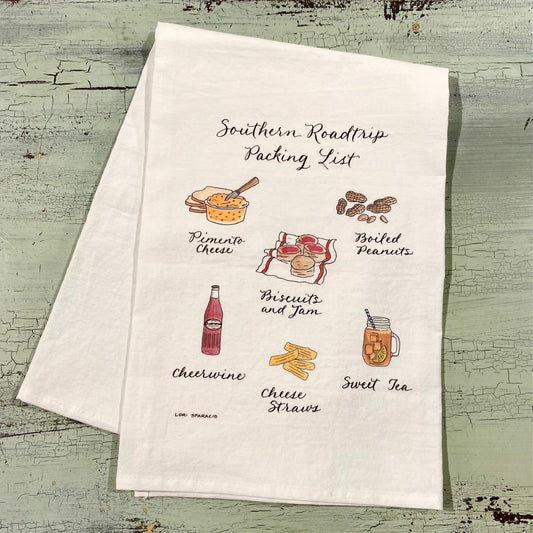Tea towel with illustrations and text on a textured surface
