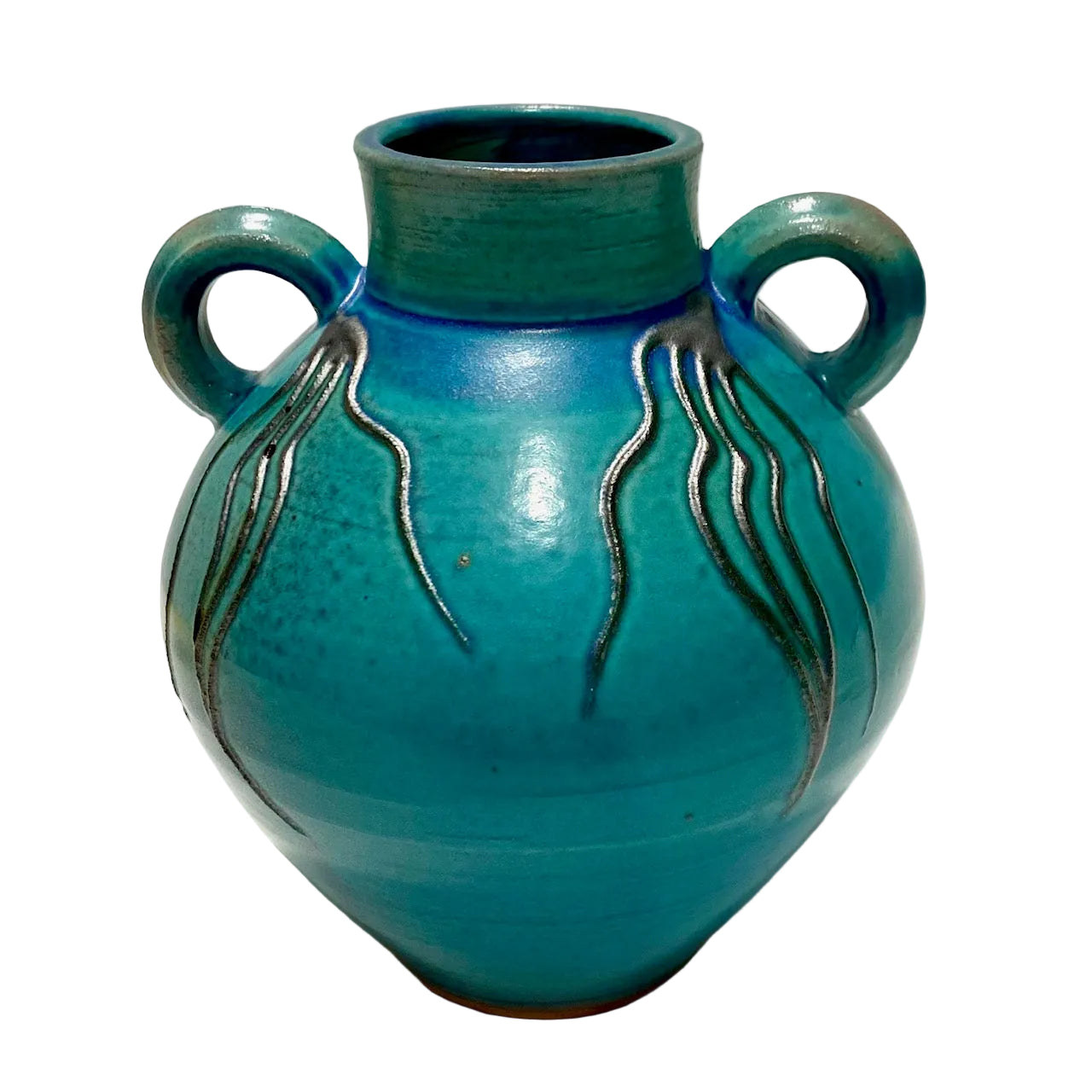 Turquoise ceramic vase with decorative patterns on a white background