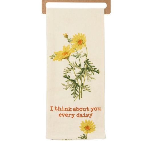 Floral-themed towel with yellow daisies and text on a white background